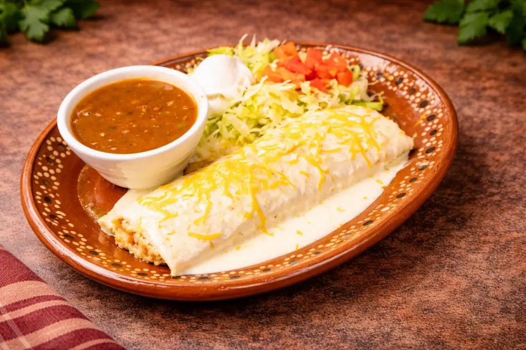 Lunch burrito in Fort Myers La Fondita mexican restaurant with sauce and cheese